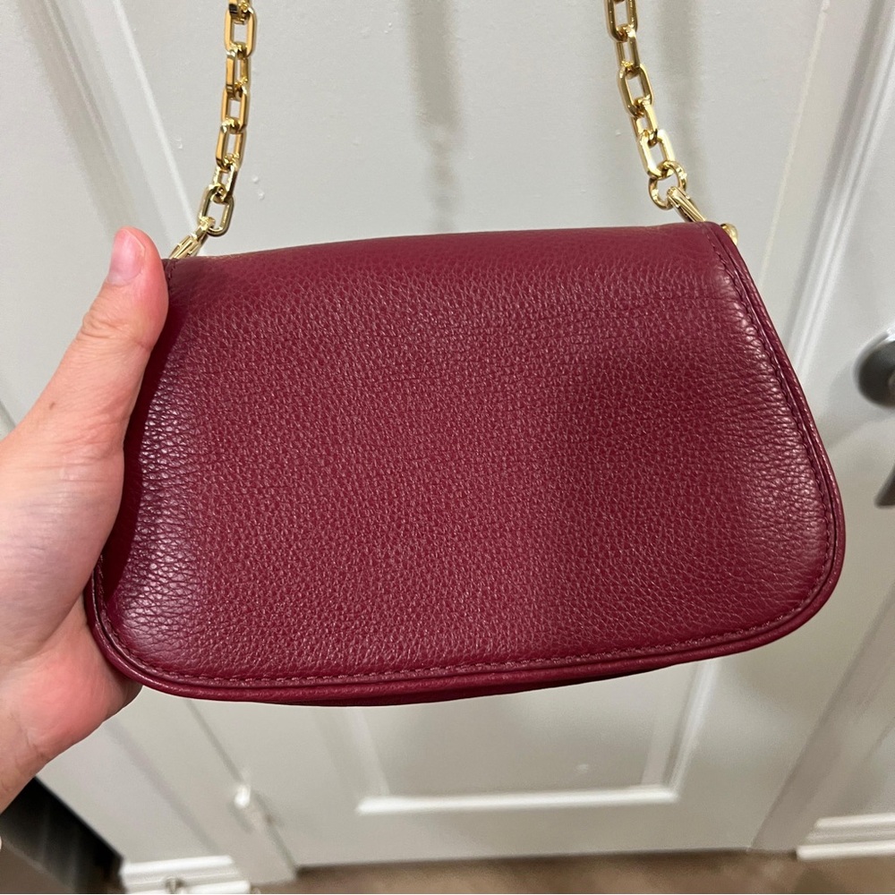 Tory Burch
Tory Burch Burgundy Leather Bitten Clutch Bag - Picture 2 of 9